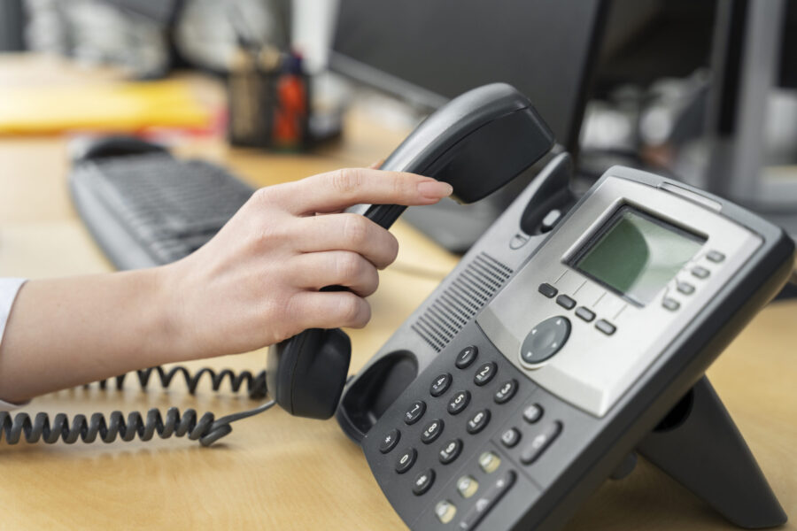 close-up-person-working-call-center-scaled